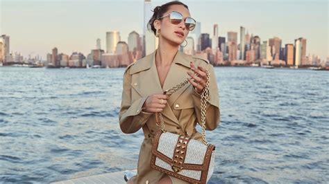 michael kors ends contract with bella hadid|bella hadid new campaign.